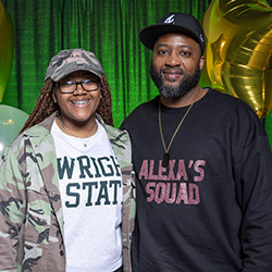 photo of a student and dad at a campus event