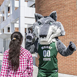 photo of rowdy waving at a student