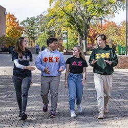 photo of students walking outside on campus