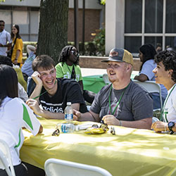 photo of students at a first friday event on campus