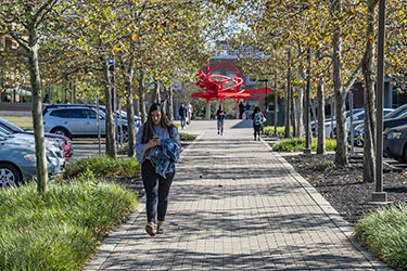 photo of students walking outside on campus