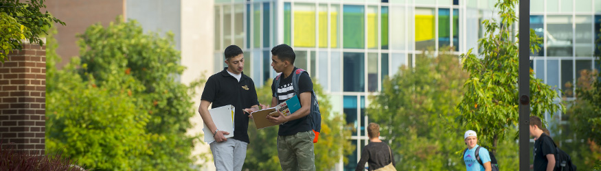 photo of students outside on campus 