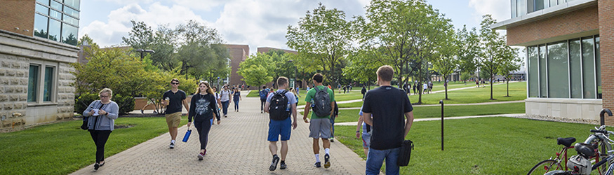 photo of students walking outside on campus