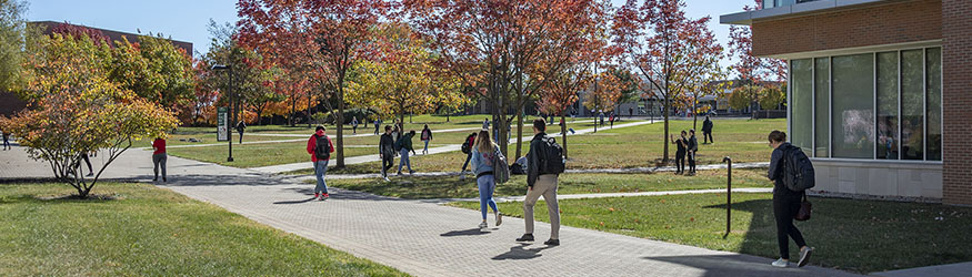 photo of students walking outside on campus