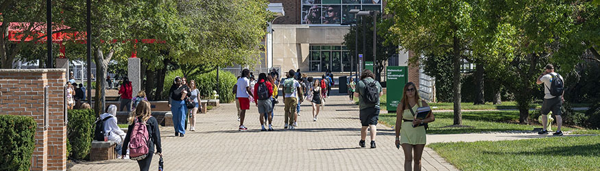 photo of students walking outside on campus