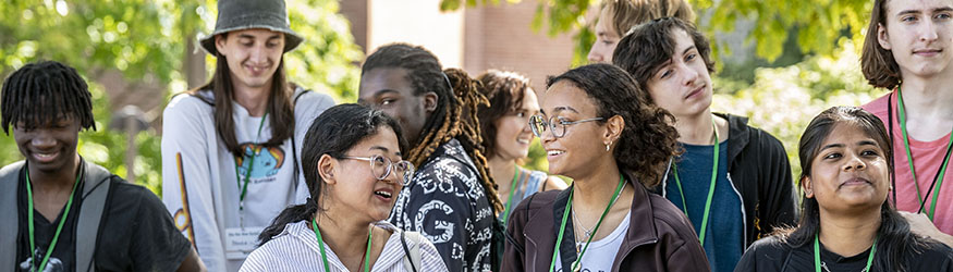 photo of students standing outside on campus