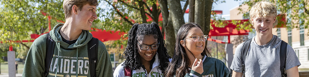 photo of students walking outside on campus