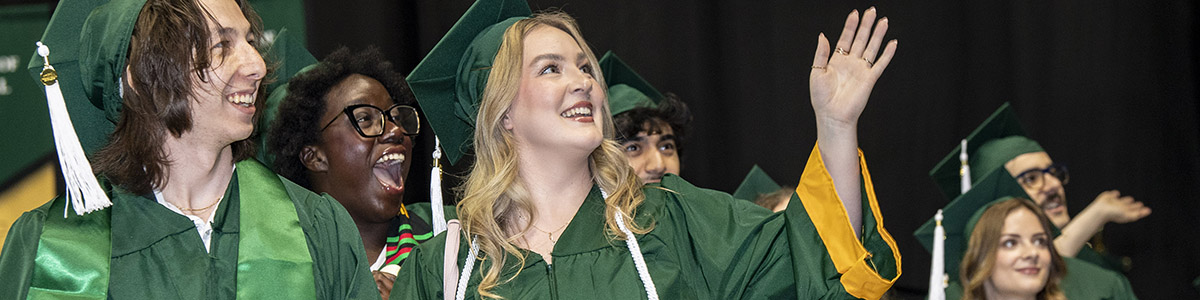 photo of happy graduates at commencement