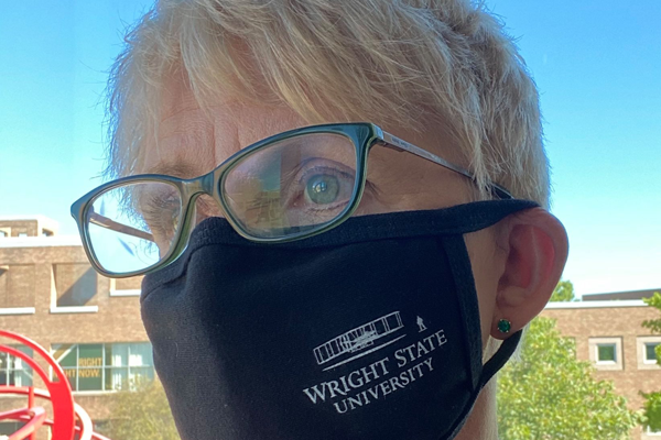 Woman in WSU mask