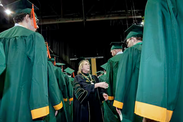 Sue Edwards congratulates graduates